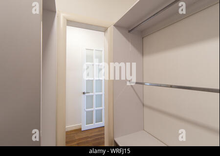 Russia, Moscow- June 15, 2018: interior room apartment. standard repair decoration in hostel. dressing room, hangers, storage system Stock Photo