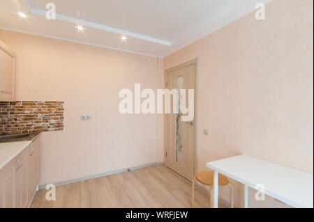Russia, Moscow- June 15, 2018: interior room apartment. standard repair decoration in hostel. kitchen and dining room Stock Photo