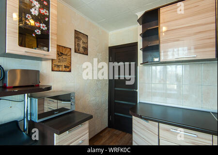 Russia, Moscow- June 15, 2018: interior room apartment. standard repair decoration in hostel. kitchen and dining room Stock Photo