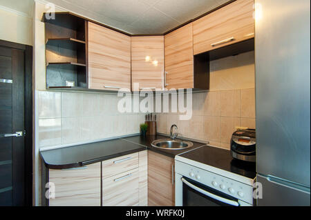 Russia, Moscow- June 15, 2018: interior room apartment. standard repair decoration in hostel. kitchen and dining room Stock Photo