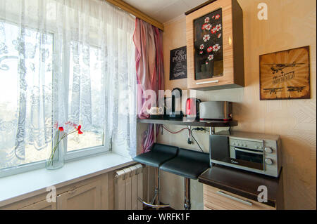 Russia, Moscow- June 15, 2018: interior room apartment. standard repair decoration in hostel. kitchen and dining room Stock Photo