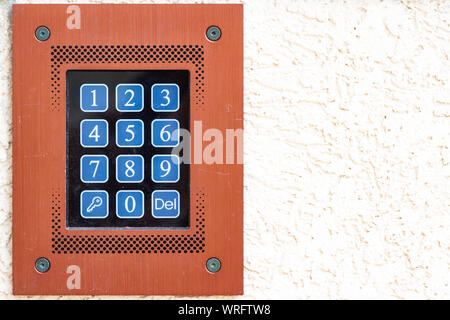 Code keypad on apartment building close-up with copy space, Hungary Stock Photo