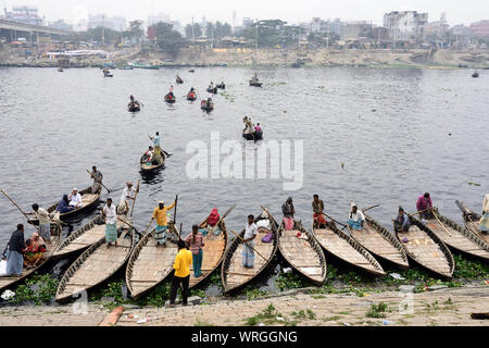 DHAKA, BENGAL BANGLADESH - 28 JANUARY 2019:  Busiest passenger traffic port in Dhaka. Boats for transport the peoples in Sadarghat on the Buriganga Ri Stock Photo