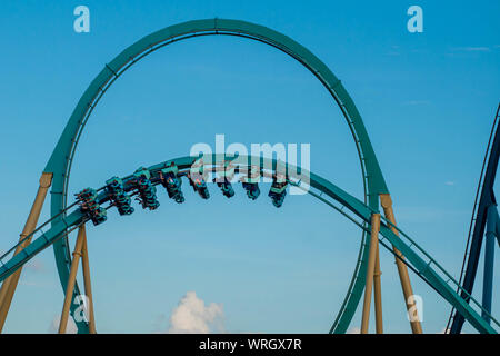 rlando, Florida. August 31, 2019. People enjoying loop in amazing Kraken rollercoaster at Seaworld Stock Photo