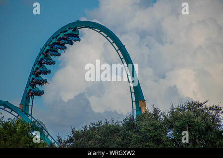 Orlando, Florida. August 31, 2019. People enjoying loop in amazing Kraken rollercoaster at Seaworld Stock Photo