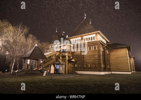 MOSCOW, RUSSIA - NOVEMBER 22, 2015: Palace of tsar Alexei Mikhailovich in Kolomenskoye and the first snowfall in the night sky Stock Photo