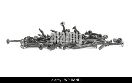 A pile of black screws. Isolated on white. Stock Photo