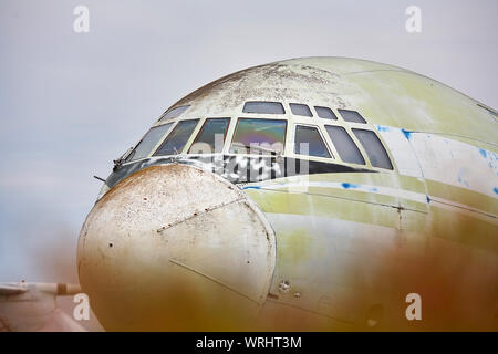 Old, shabby military transport, cargo plane close-up. Stock Photo