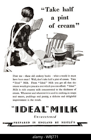 Early 1930's, 'tween the wars print advertising for Ideal original full cream evaporated milk. With a rich, creamy taste and a good source of nutrients, made from full cream milk with natural calcium and enriched with vitamin D, it was popular as an addition to sweet or savory dishes, pastries, beverages,smoothies, cereals and tea. Stock Photo