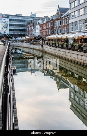 Aarhus Downtown with restaurants reflecting in the canal and space for copy, Denmark, July 15, 2019 Aarhus Downtown with restaurants reflecting in the canal and space for copy, Denmark, July 15, 2019