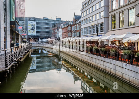 Downtown Aarhus with restaurants reflecting in the canal in the evening, Denmark, July 15, 2019
