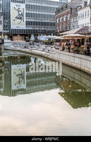 Aarhus city with space for text and a variety of restaurants and buildings reflecting in the canal, Denmark, July 15, 2019