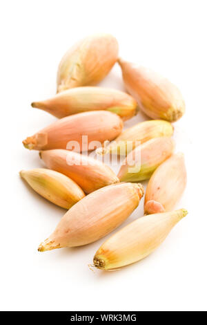 The golden shallot onion isolated on white background. Fresh bulbs. Stock Photo
