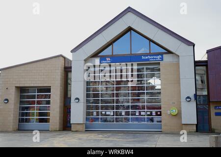 The lifeboat station with shop on the sea front at Scarboroughs south bay Scarborough Yorkshire England Stock Photo