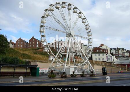 A white Big wheel on the south bay sea front at Scarborough Yorkshire England Stock Photo