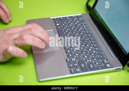 Business man typing on laptop . hands businessman working with laptop devices and using digital computer . Stock Photo