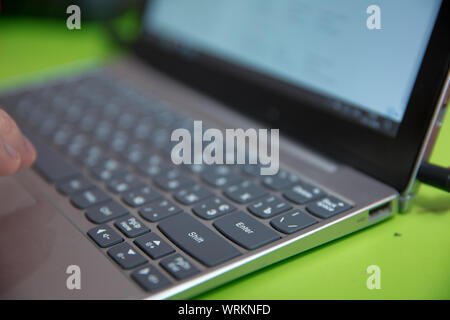Business man typing on laptop . hands businessman working with laptop devices and using digital computer . Stock Photo