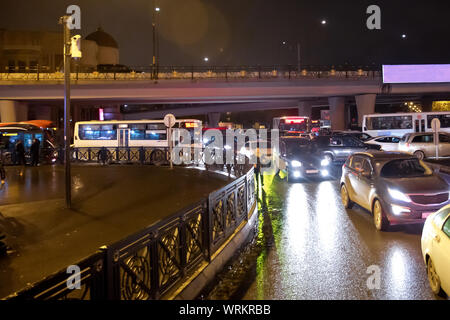 Evening traffic jam in Baku on one of streets in the downtown . Queue of cars on the street during the rush hour . Traffic jam in the rush hour . Stock Photo