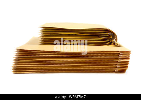 Stack of padded mailing envelopes isolated against a white background Stock Photo