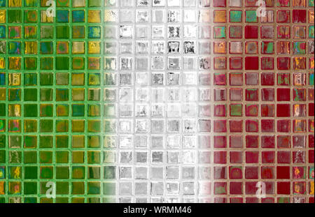 Tiled wall made by translucent tiles where colors form the flag of Italy Stock Photo