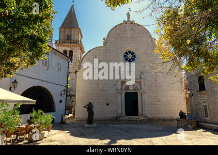 Beautiful historical old town main square of Osor on Cres island with assumption of Mary st. gaudentius church Stock Photo