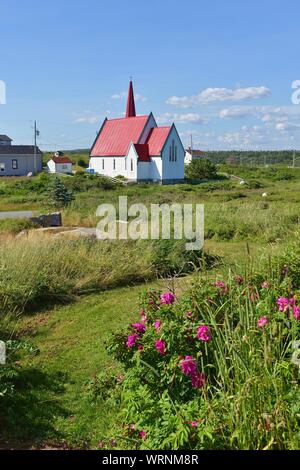 HALIFAX, CANADA -20 JUL 2019- View of the picturesque St John’s Anglican Church, a historic Carpenter Gothic style church in Peggy’s Cove outside of H Stock Photo