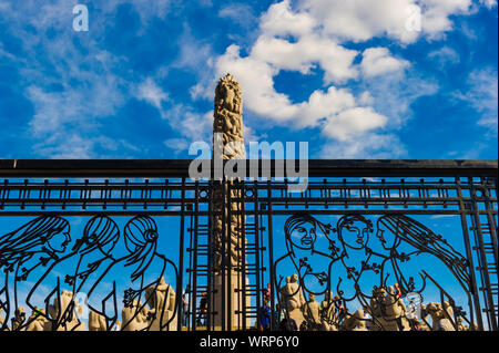 Oslo - July 24: The Monolith statue behind large metal gates at the Vigeland Sculpture Arrangement in Frogner Park on July 24, 2010 in Oslo, Norway Stock Photo