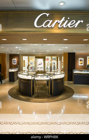 Interior of Kansai Airport, Osaka, Japan, in the International Departures  lounge. View into the Cartier store with Cartier logo over the entrance  Stock Photo - Alamy