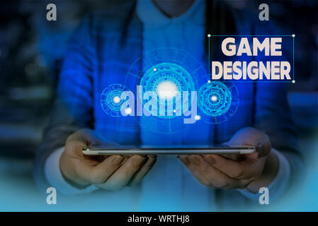 Handwriting text writing Game Designer. Conceptual photo Campaigner Pixel Scripting Programmers Consoles 3D Graphics Woman wear formal work suit prese Stock Photo
