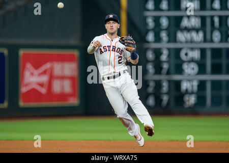 Houston Astros third baseman Alex Bregman (2) throws to first in the eighth  inning against the Seattle Mariners, Wednesday, May 4, 2022, in Houston, T  Stock Photo - Alamy