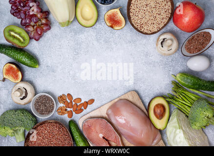 trendy pegan diet. pegan diet products : meat, fish, cereals, vegetables, nuts and berries. view from above Stock Photo