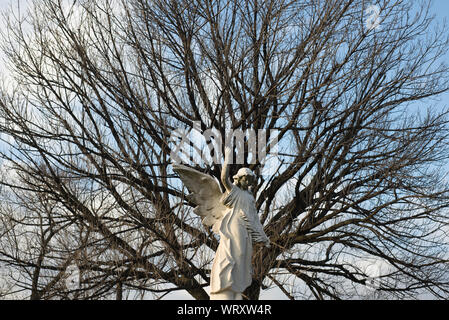 Angel statue / monument in Calvary Cemetery in Queens, New York. Stock Photo