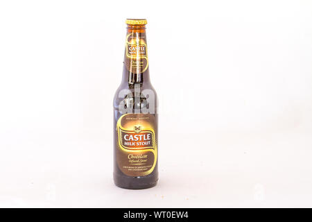 Johannesburg, South Africa - an ice-cold chocolate infused Castle Milk Stout produced in South Africa isolated on a white background Stock Photo