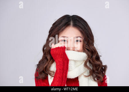 Portrait of a beautiful  young asian woman in warm clothes Stock Photo