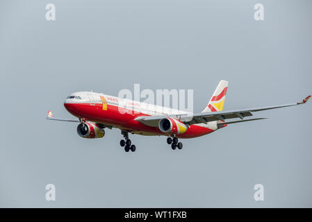 Chengdu airport, Sichuan province, China - August 28, 2019 : Lucky Air Airbus A330 commercial airplane against sky. Stock Photo