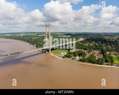 Wide photo of The Humber Bridge, near Kingston upon Hull, East Riding of Yorkshire, England, single-span road suspension bridge, taken on a sunny day Stock Photo