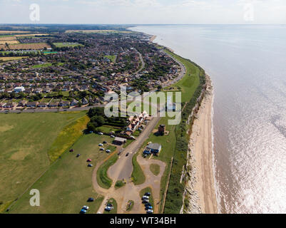 Aerial photo of the British seaside town of Hunstanton in Norfolk showing the white Lighthouse and beauiful coastal cliffs on a bright sunny day. Stock Photo