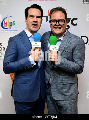 Jimmy Carr and Alan Carr (right) during the 15th BGC annual charity day