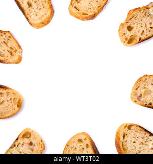 Frame of pieces of white bread isolated on white background. Stock Photo
