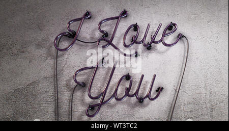 Turned off Neon sign saying I love you in bright pink Stock Photo