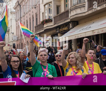 Sarajevo, Bosnia and Herzegovina. 8th Sep, 2019. Protesters rise their fists during the pride parade.''Ima Izac!'' translated as ''Open the door, please'' was the motto of the first Bosnian LGBTIQ pride parade, It's a request for more freedom in a country still endangered by religious radicalism. The parade represented an historical moment in Bosnian history. Credit: Pierpaolo Totti/SOPA Images/ZUMA Wire/Alamy Live News Stock Photo