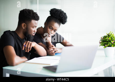 Business people with laptop in office Stock Photo