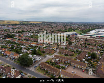 Aerial photo of the town of Shoreham-by-Sea, a seaside town and port in West Sussex, England UK, showing typical housing estates and businesses taken Stock Photo