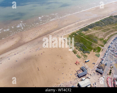 Aerial photo of the British seaside town of Skegness in the East Lindsey a district of Lincolnshire, England, showing the beach and pier on a beautifu Stock Photo