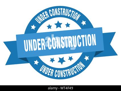 under construction ribbon. under construction round blue sign. under construction Stock Vector