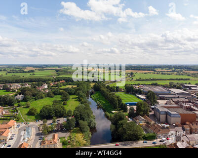 Aerial photo of the the historic town of Tadcaster located in West Yorkshire in the UK, taken on a bright sunny day Stock Photo