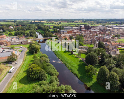 Aerial photo of the the historic town of Tadcaster located in West Yorkshire in the UK, taken on a bright sunny day Stock Photo