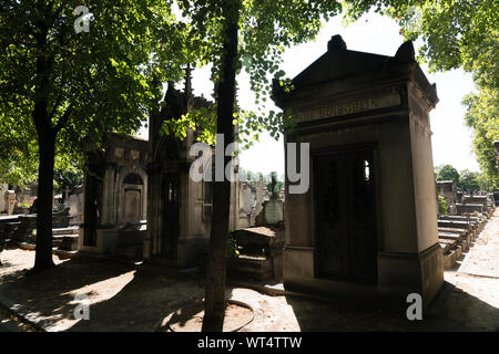 Montparnasse Cemetery, Tree-lined graveyard with the resting places of writers & artists including Sartre & Beckett. Stock Photo