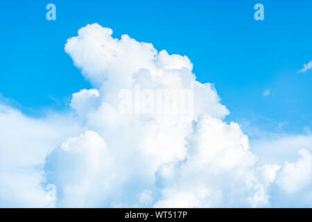 White clouds in blue sky, abstract blurred background. Stock Photo