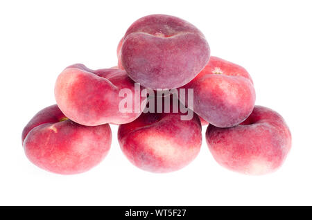 Heap of sweet paraguaya peaches isolated on white background. Studio Photo Stock Photo